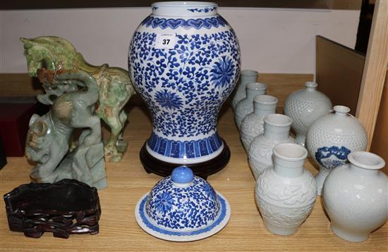 Eight celadon glazed vases and a blue and white jar and cover, largest H.48cm